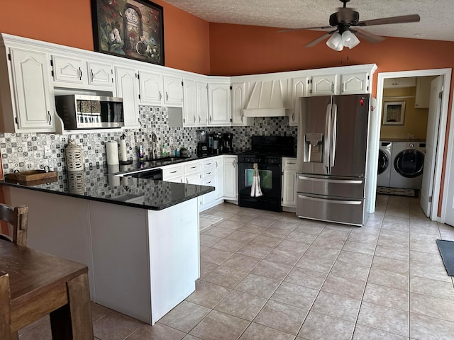 1048 Parkway Dr, Logan, OH 43138 - kitchen featuring dark countertops, custom range hood, appliances with stainless steel finishes, a peninsula, and a sink