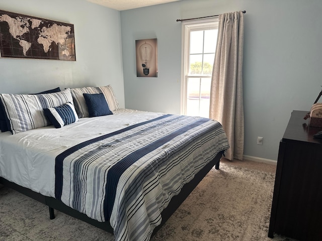 1048 Parkway Dr, Logan, OH 43138 - bedroom featuring carpet and baseboards