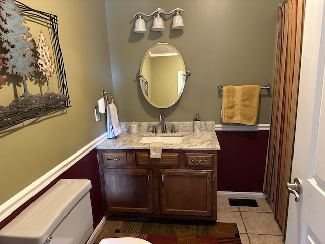 1048 Parkway Dr, Logan, OH 43138 - bathroom featuring tile patterned flooring, vanity, and toilet