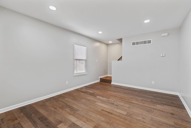 empty room featuring hardwood / wood-style floors