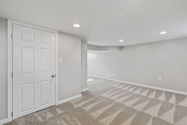 basement featuring carpet flooring