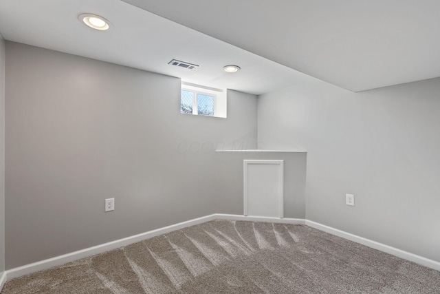 basement featuring carpet flooring