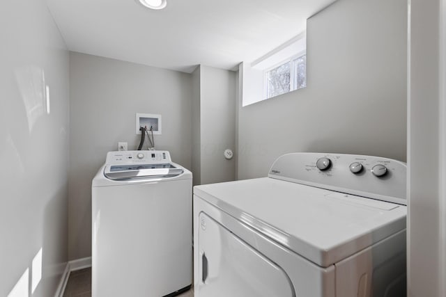 laundry room featuring separate washer and dryer