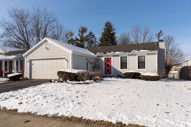 single story home with a garage