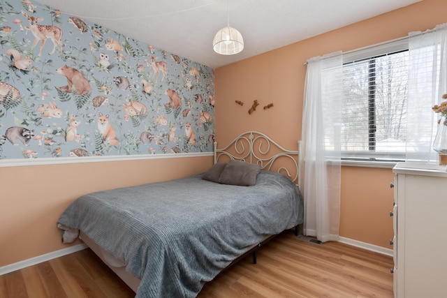 bedroom featuring light hardwood / wood-style floors