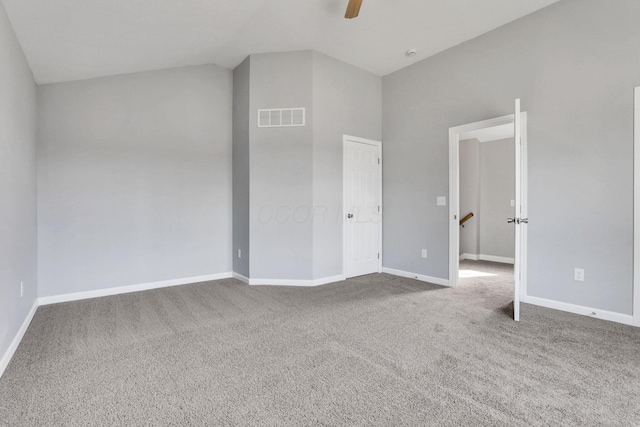 unfurnished bedroom with lofted ceiling, carpet flooring, and ceiling fan