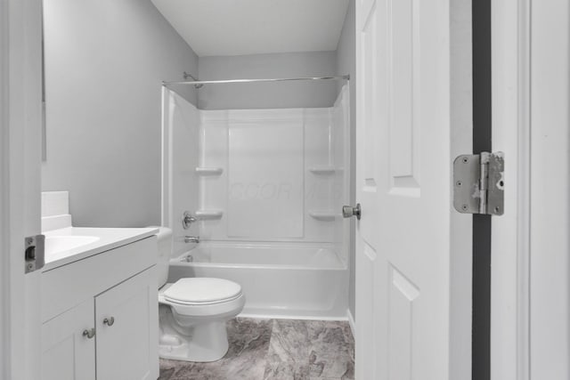 full bathroom with bathtub / shower combination, vanity, and toilet