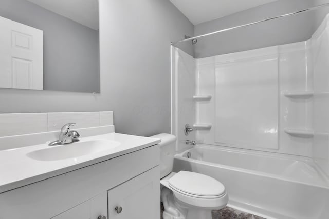 full bathroom with shower / tub combination, vanity, and toilet