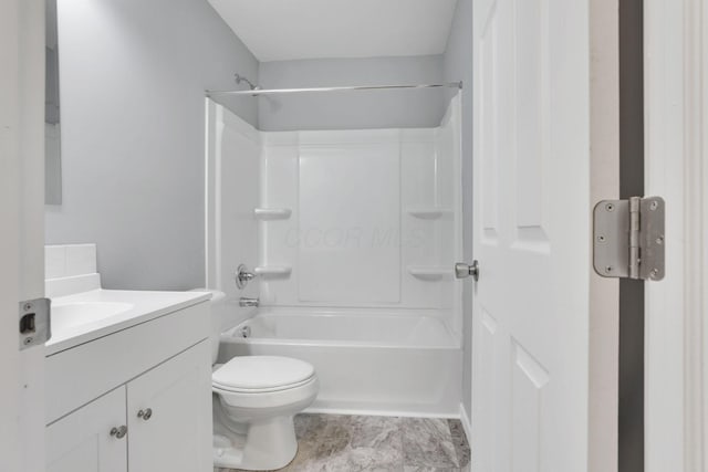 full bathroom with bathtub / shower combination, vanity, and toilet