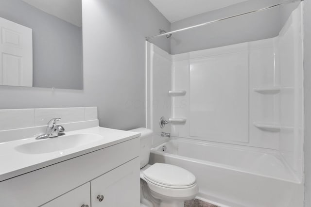 full bathroom with shower / tub combination, vanity, and toilet