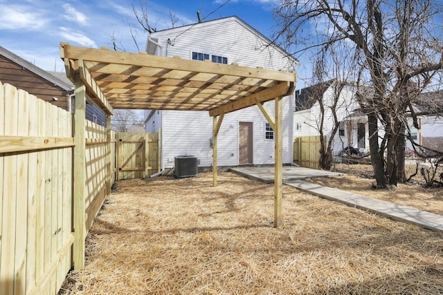 exterior space with cooling unit and a carport