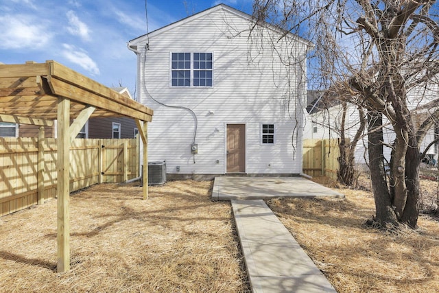 back of house featuring cooling unit and a patio area