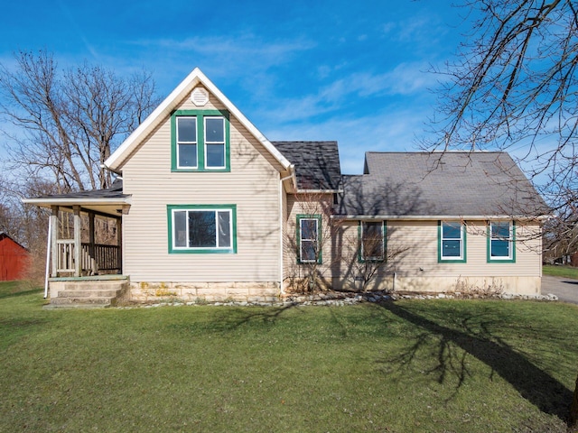 view of front of house with a front lawn and a porch