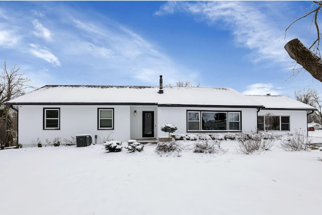 ranch-style house featuring cooling unit