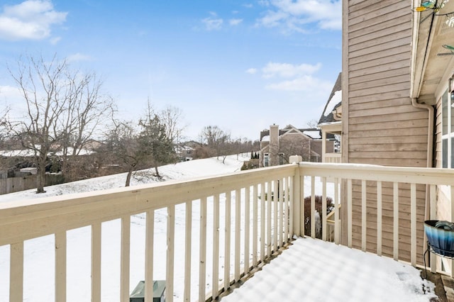 view of snow covered deck