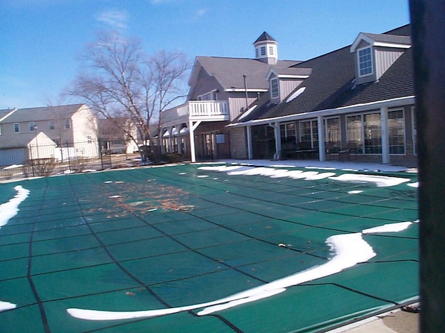 pool featuring fence