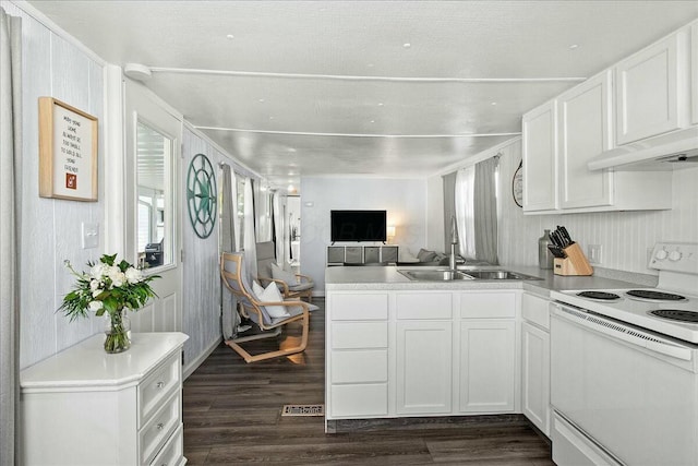 kitchen featuring sink, dark hardwood / wood-style floors, white cabinets, and white range with electric cooktop