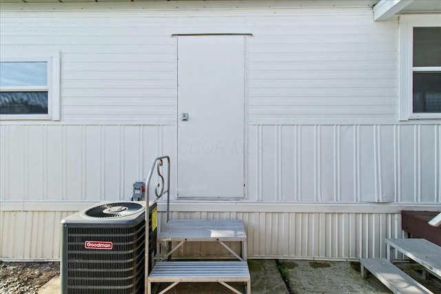 exterior space featuring cooling unit