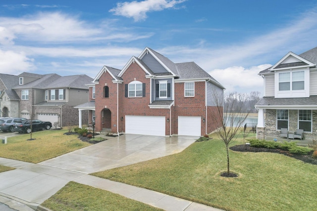 view of front of house with a garage and a front lawn