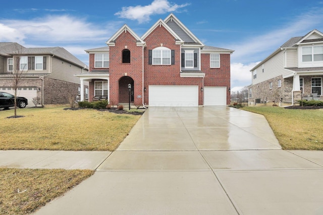 view of front of home featuring a garage and a front lawn