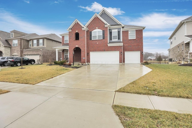 view of front facade with a garage and a front lawn