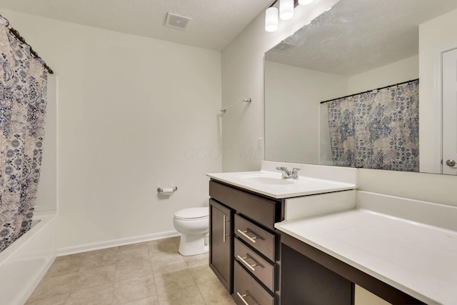 full bathroom featuring toilet, a textured ceiling, vanity, shower / bath combo, and tile patterned flooring