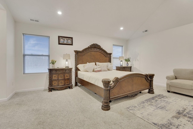 carpeted bedroom featuring vaulted ceiling