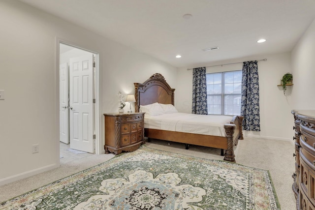 bedroom featuring light colored carpet