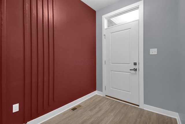 entrance foyer featuring light wood-type flooring