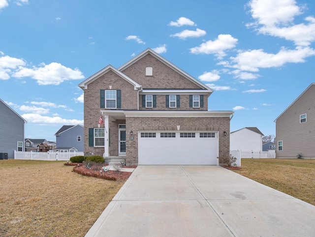 view of front facade featuring a garage and a front yard