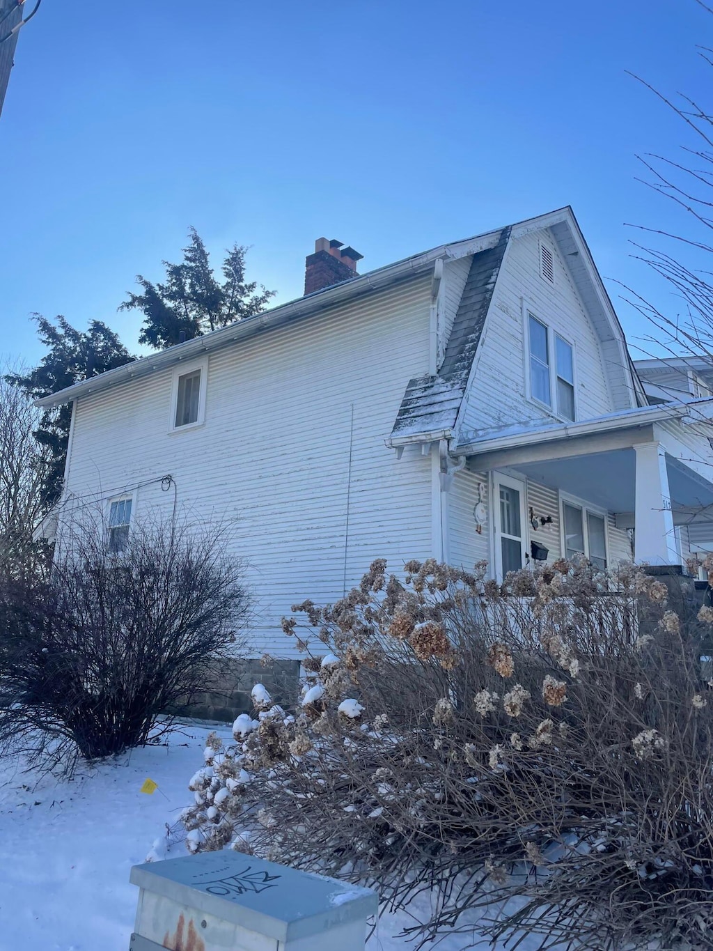 view of snow covered property