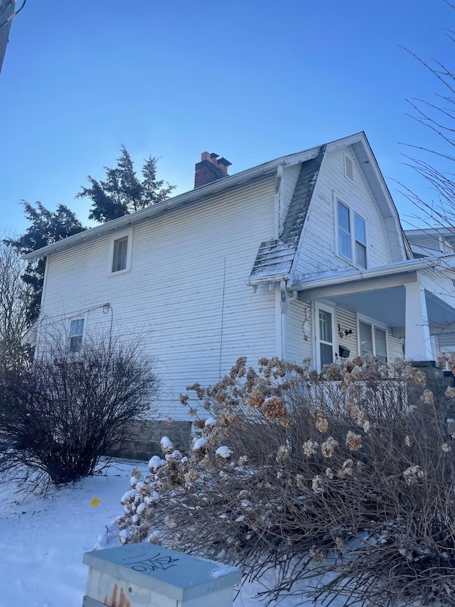 view of snow covered property