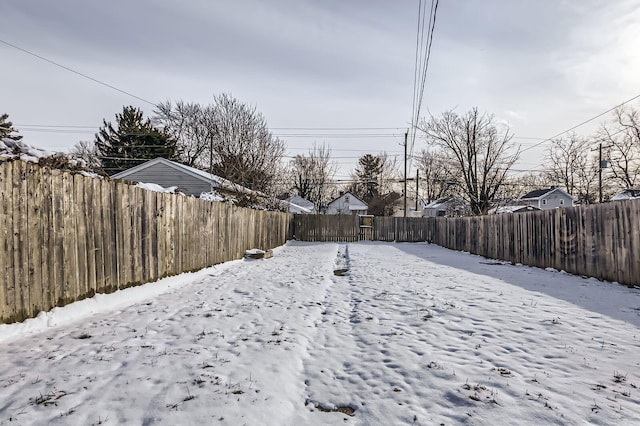 1437 Manchester Ave, Columbus, OH 43211 - snowy yard with a fenced backyard