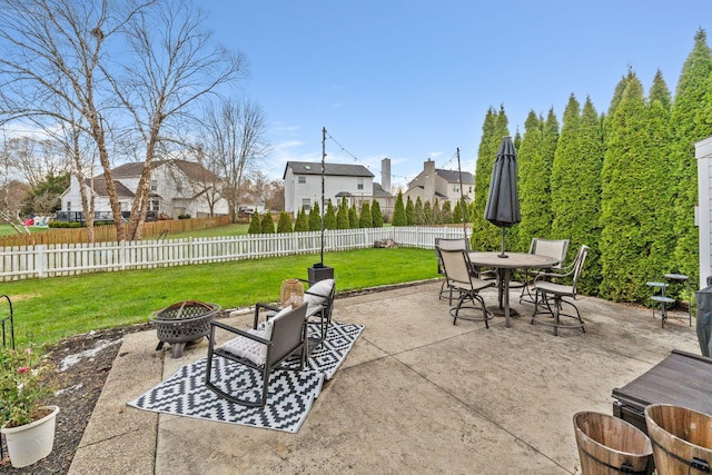 view of patio / terrace featuring an outdoor fire pit