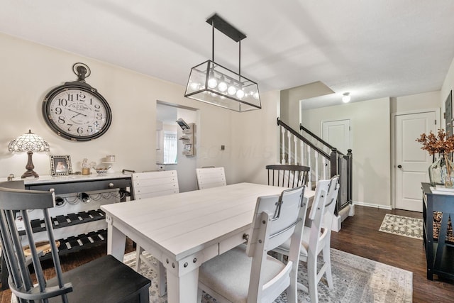 dining room featuring dark hardwood / wood-style flooring