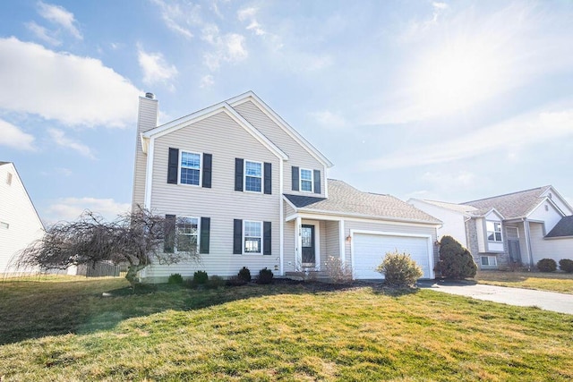 view of front of home with a garage and a front lawn