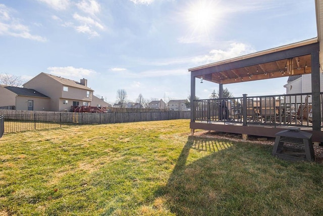 view of yard with a wooden deck