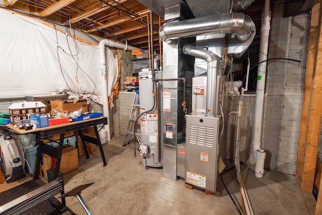 utility room featuring gas water heater