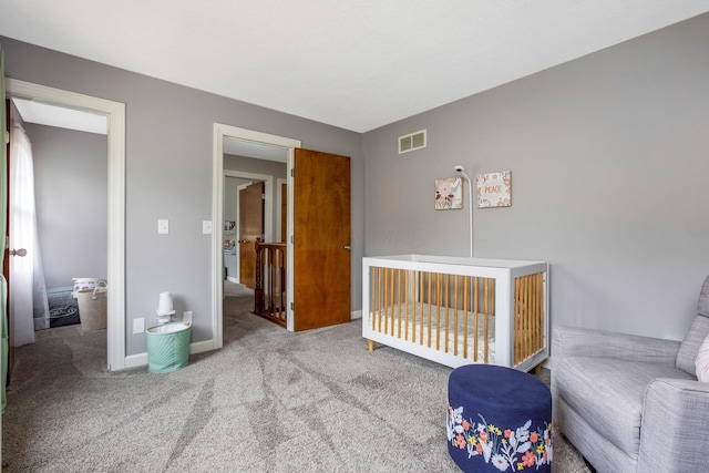 bedroom featuring baseboards, visible vents, and carpet floors
