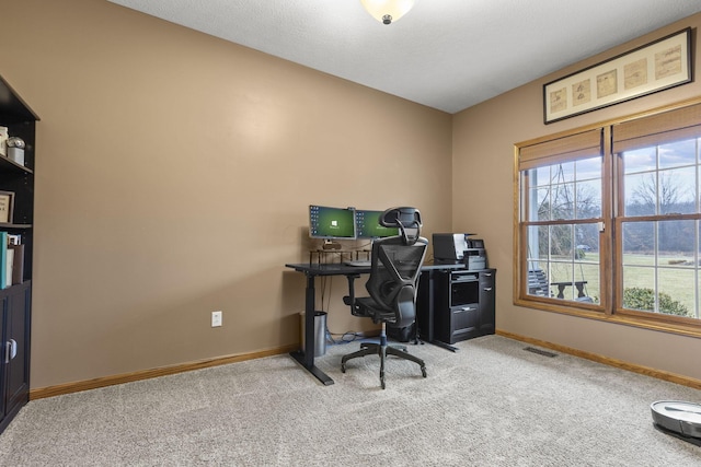 view of carpeted office space