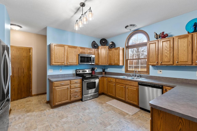 kitchen featuring appliances with stainless steel finishes and sink