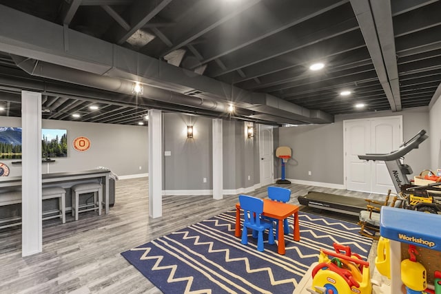 playroom with hardwood / wood-style floors