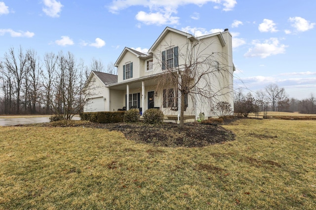 view of front of property featuring a garage, a porch, and a front yard