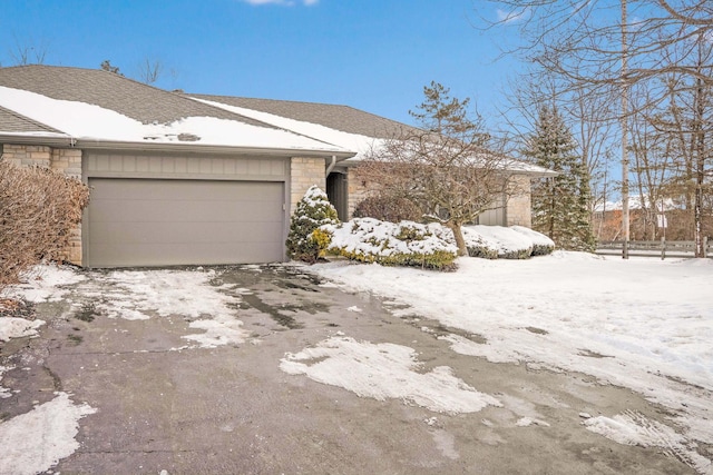 single story home featuring a garage