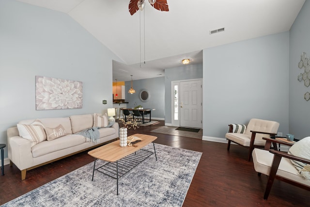 living room featuring visible vents, dark wood-type flooring, a ceiling fan, high vaulted ceiling, and baseboards