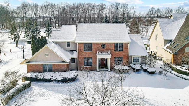 view of front of home with brick siding