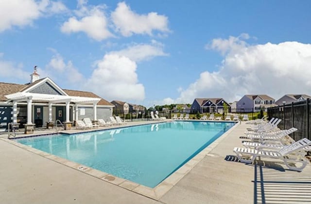 view of pool featuring a patio area