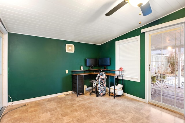 home office with ceiling fan, plenty of natural light, and vaulted ceiling