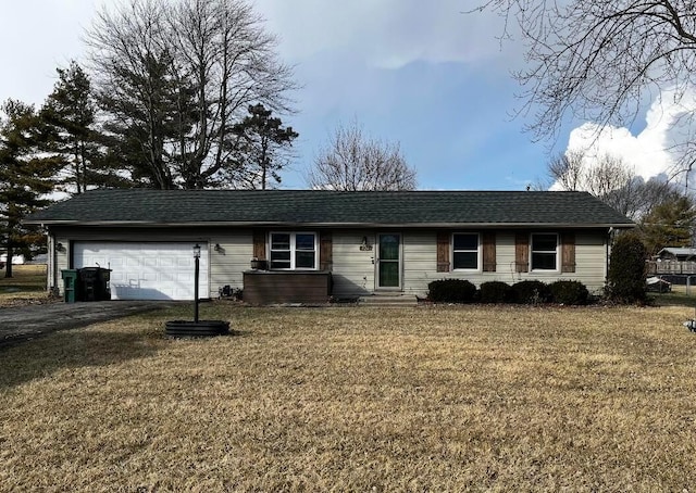 ranch-style house featuring driveway, entry steps, a shingled roof, an attached garage, and a front lawn