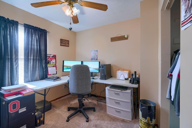 home office featuring ceiling fan, carpet, and plenty of natural light